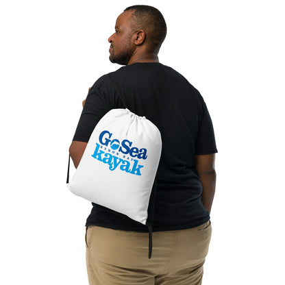  Drawstring Bag - White - Front view - being warn on man's back - Go Sea Kayak Byron Bay logo on front  - Genuine Byron Bay Merchandise | Produced by Go Sea Kayak Byron Bay 