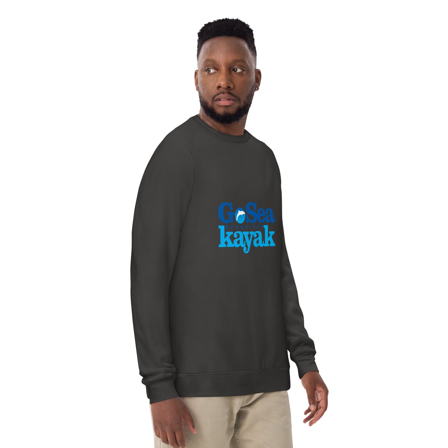  Unisex Sweatshirt - Coal - side view being warn by man with arms by side - Go Sea Kayak Byron Bay logo on front - Genuine Byron Bay Merchandise | Produced by Go Sea Kayak Byron Bay 