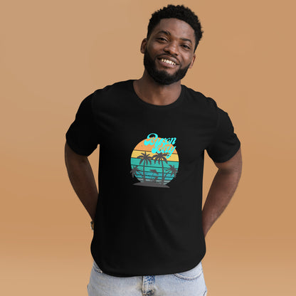  Unisex T-Shirt - Black - Front view, on man standing with hands in his back pockets - Byron Bay design on front - Genuine Byron Bay Merchandise | Produced by Go Sea Kayak Byron Bay 