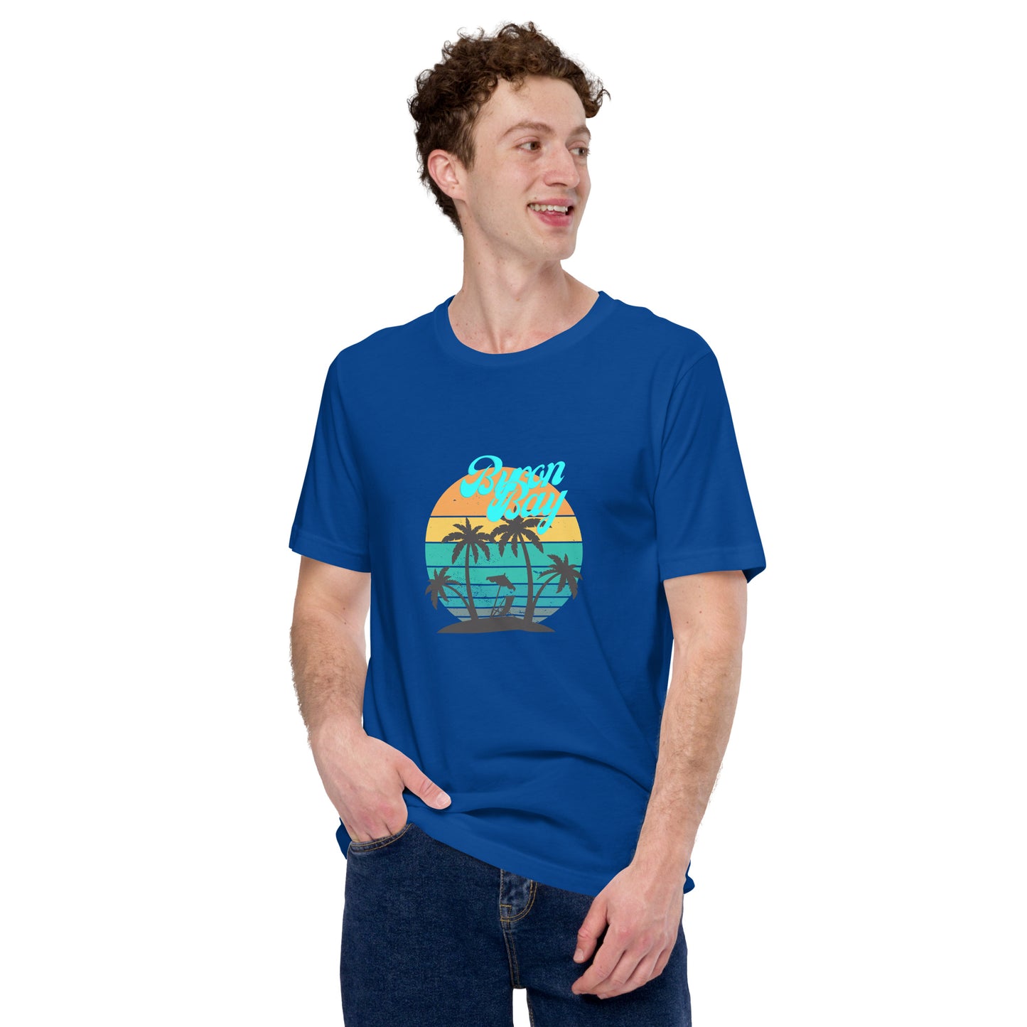  Unisex T-Shirt - True Royal Blue - Front view being warn by man one hand in pocket - Byron Bay design on front - Genuine Byron Bay Merchandise | Produced by Go Sea Kayak Byron Bay 