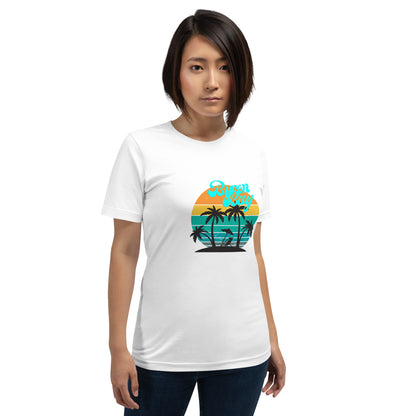  Unisex T-Shirt - White - Front view, on woman standing with arms by side - Byron Bay design on front - Genuine Byron Bay Merchandise | Produced by Go Sea Kayak Byron Bay 