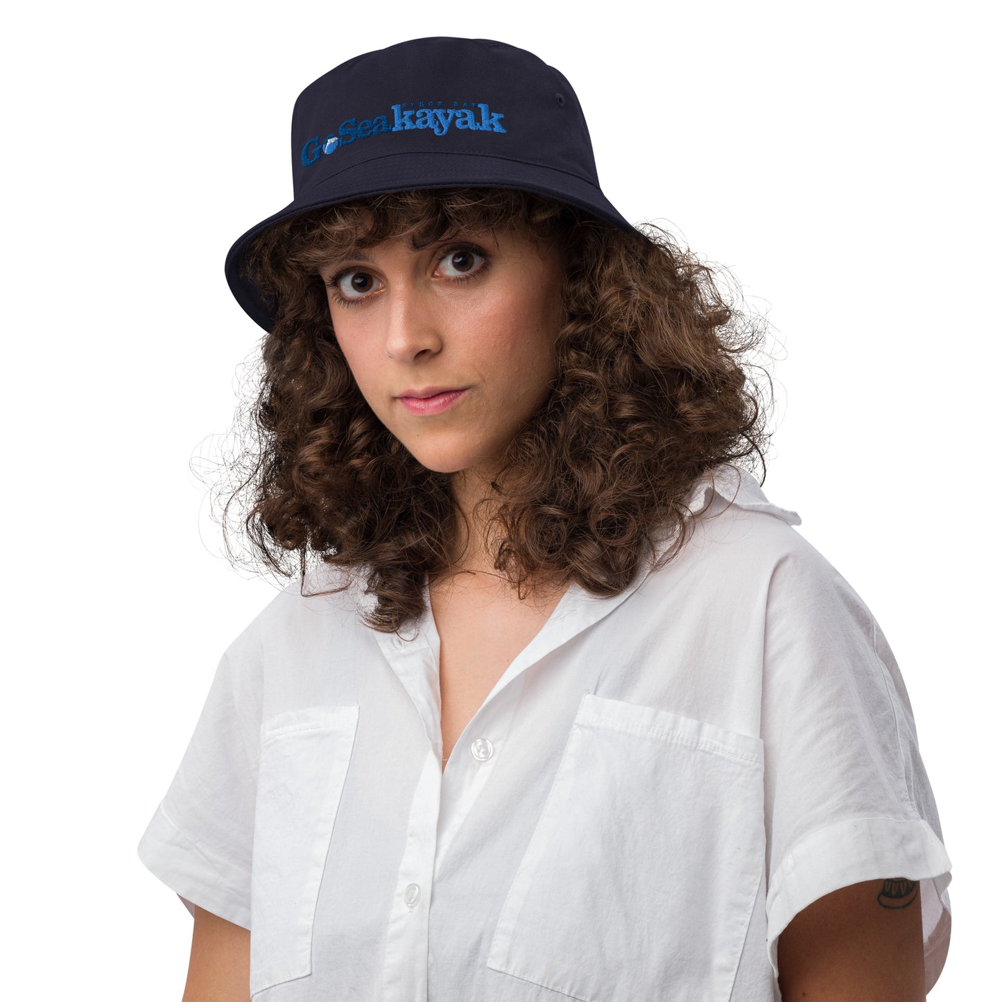  Unisex Bucket Hat - Navy - Front view on woman's head - Go Sea Kayak Byron Bay logo on front  - Genuine Byron Bay Merchandise | Produced by Go Sea Kayak Byron Bay