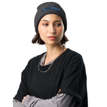  Waffle Beanie - Charcoal - Front view, on woman standing with arms crossed - Go Sea Kayak Byron bay logo on front - Genuine Byron Bay Merchandise | Produced by Go Sea Kayak Byron Bay 