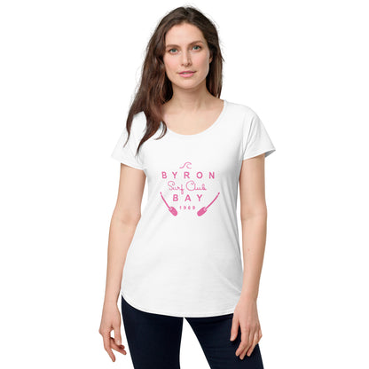  Women’s Round Neck Tee - White - Front view, on woman standing with arms by side - pink Byron Bay Surf Club logo on front - Genuine Byron Bay Merchandise | Produced by Go Sea Kayak Byron Bay 