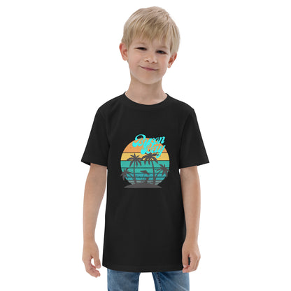  Kids T-Shirt - Black  - Front view, being warn on boy standing with his arms by his side - Byron Bay design on front - Genuine Byron Bay Merchandise | Produced by Go Sea Kayak Byron Bay 